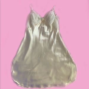 Elegant white silky dress with pearl n lace trim around the bust/shoulder area.